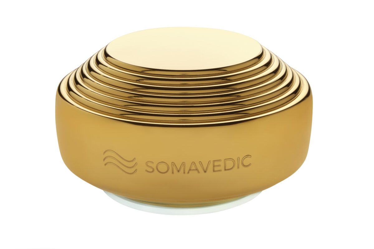 Somavedic Gold — premium EMF protection device with 24K gold-plated glass shell